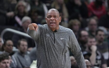 Feb 2, 2025; Milwaukee, Wisconsin, USA; Milwaukee Bucks coach Doc Rivers yells out instructions to the Milwaukee Bucks during a game against the Memphis Grizzlies in the first half at Fiserv Forum. Mandatory Credit: Michael McLoone-Imagn Images