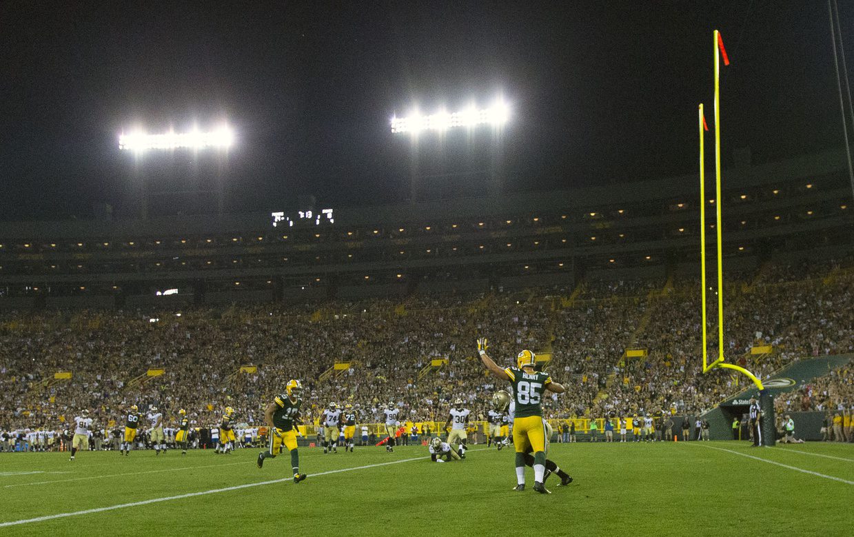 Sep 3, 2015; Green Bay, WI, USA; Green Bay Packers wide receiver Myles White (19) scores a touchdown during the fourth quarter against the New Orleans Saints at Lambeau Field. Mandatory Credit: Jeff Hanisch-USA TODAY Sports