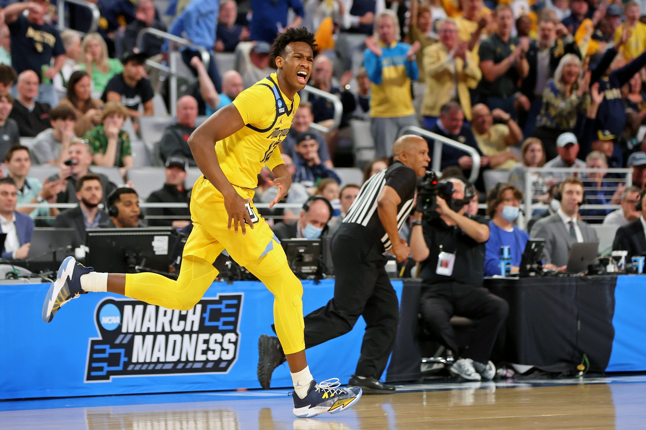 Mar 17, 2022; Fort Worth, TX, USA; Marquette Golden Eagles forward Olivier-Maxence Prosper (12) reacts after a play against the North Carolina Tar Heels during the first half during the first round of the 2022 NCAA Tournament at Dickies Arena. Mandatory Credit: Kevin Jairaj-Imagn Images