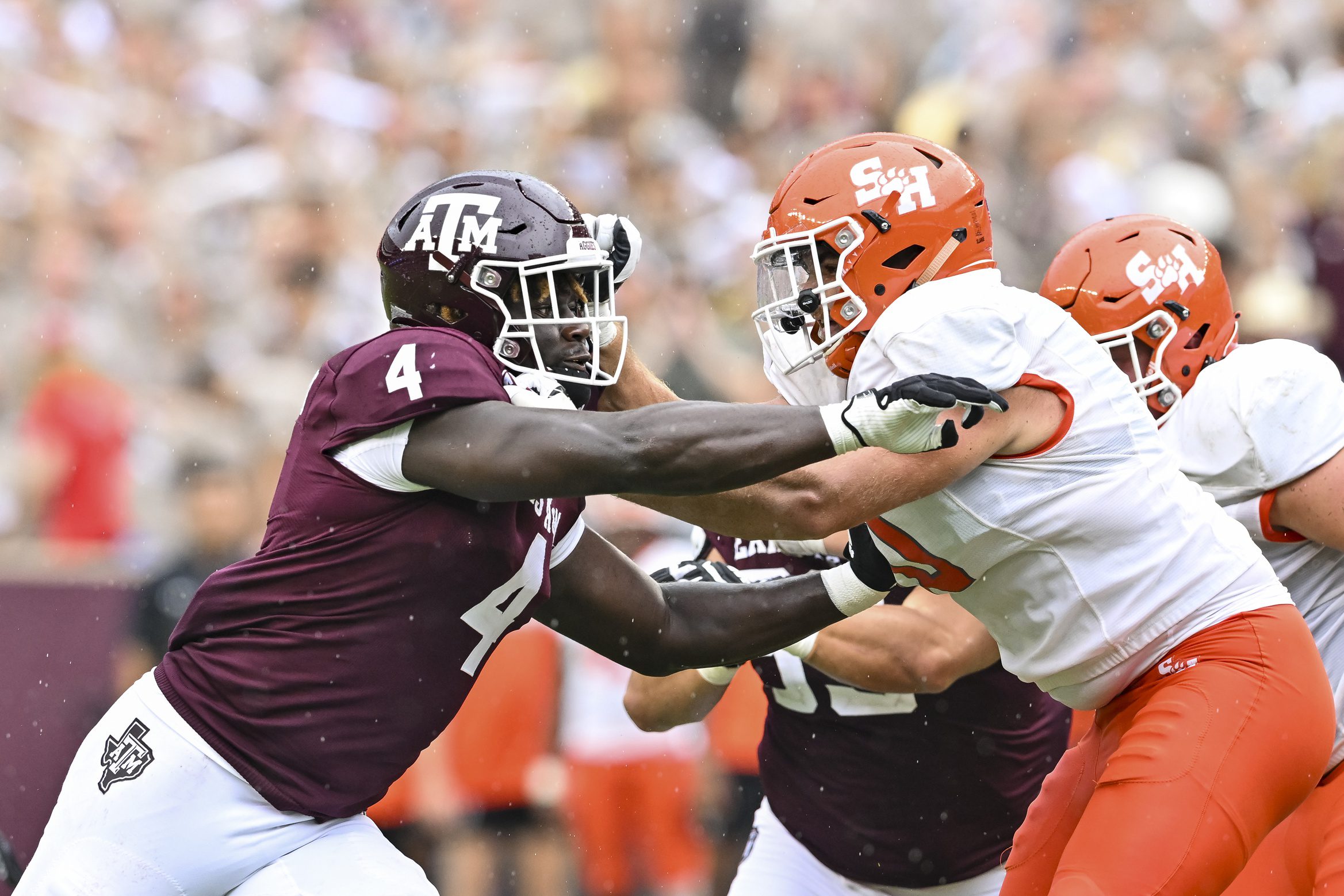 Sep 3, 2022; College Station, Texas, USA; Texas A&M Aggies defensive lineman Shemar Stewart (4) and Sam Houston State Bearkats offensive lineman Jordan Boatman (70) in action during the fourth quarter at Kyle Field. Mandatory Credit: Maria Lysaker-Imagn Images