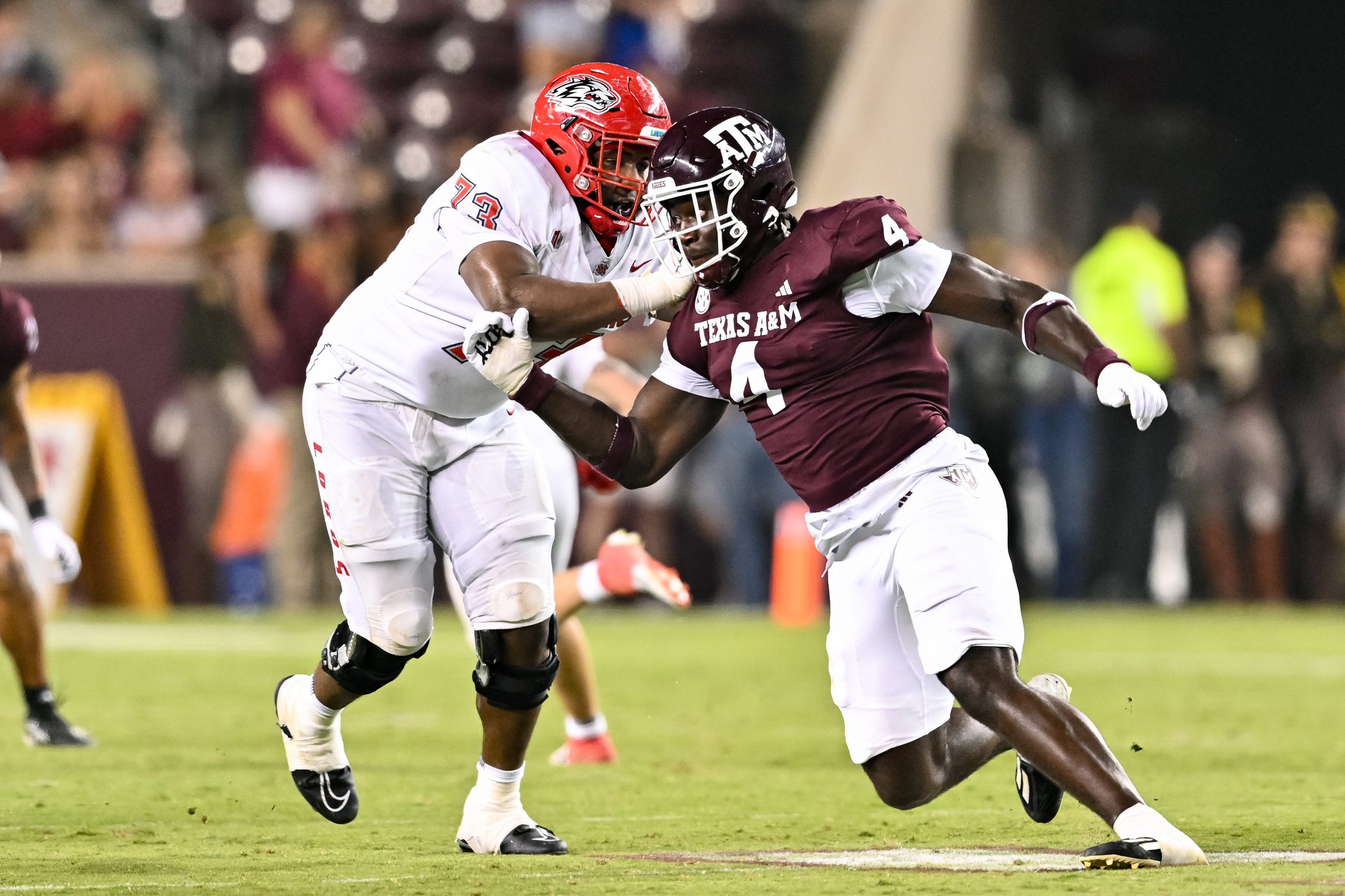 Sep 2, 2023; College Station, Texas, USA; Texas A&M Aggies defensive lineman Shemar Stewart (4) breaks past New Mexico Lobos offensive lineman Matthew Toilolo (74) during the fourth quarter at Kyle Field. Mandatory Credit: Maria Lysaker-Imagn Images Packers