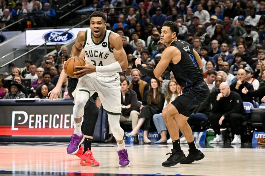 Feb 3, 2024; Dallas, Texas, USA; Milwaukee Bucks forward Giannis Antetokounmpo (34) and Dallas Mavericks guard Josh Green (8) in action during the game between the Dallas Mavericks and the Milwaukee Bucks at the American Airlines Center. Mandatory Credit: Jerome Miron-Imagn Images