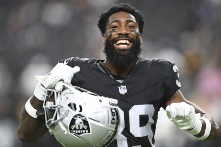 Aug 17, 2024; Paradise, Nevada, USA; Las Vegas Raiders cornerback Nate Hobbs (39) dances during warmup against the Dallas Cowboys at Allegiant Stadium. Mandatory Credit: Candice Ward-USA TODAY Sports