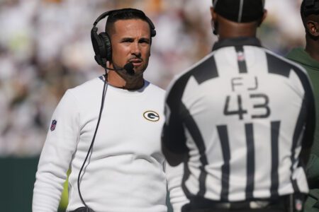 Oct 20, 2024; Green Bay, Wisconsin, USA; Green Bay Packers head coach Matt LaFleur talks with an official during the second quarter against the Houston Texans at Lambeau Field. Mandatory Credit: Jeff Hanisch-Imagn Images