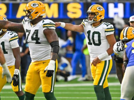 Green Bay Packers guard Elgton Jenkins (74) and Green Bay Packers quarterback Jordan Love (10)