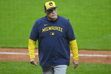 May 13, 2025; Cleveland, Ohio, USA; Milwaukee Brewers manager Pat Murphy (49) walks on the field during a pitching change in the seventh inning against the Cleveland Guardians at Progressive Field. Mandatory Credit: David Richard-Imagn Images