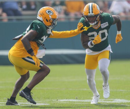 Green Bay Packers safeties Xavier McKinney (29) and Javon Bullard (20)