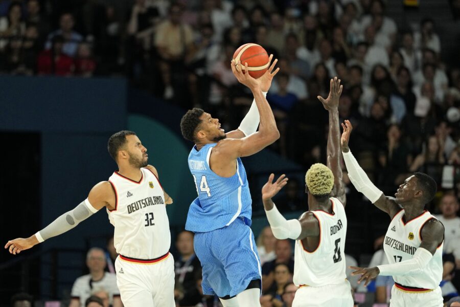 Report links Giannis Antetokounmpo’s Greece absence to money matters 1 Aug 6, 2024; Paris, France; Greece small forward Giannis Antetokounmpo (34) shoots the ball against Germany during a menís basketball quarterfinal game during the Paris 2024 Olympic Summer Games at Accor Arena. Mandatory Credit: Kyle Terada-Imagn Images