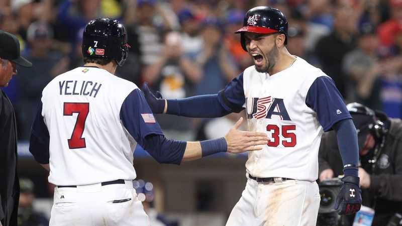 Eric Hosmer celebrates a home run in the 2017 World Baseball Classic with current Brewer Christian Yelich (Hayne Palmour IV/San Diego Union-Tribune)
