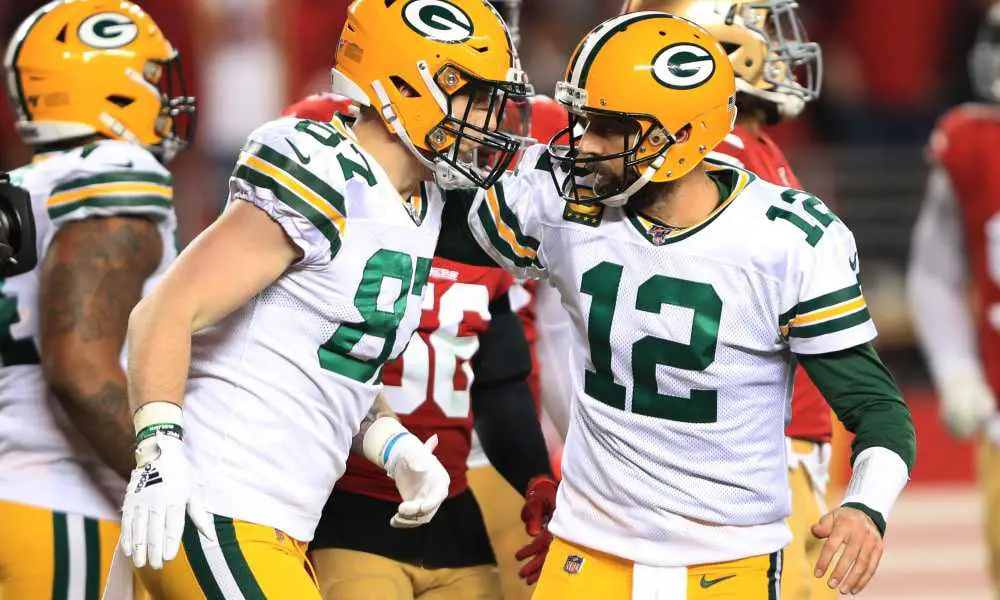 SANTA CLARA, CALIFORNIA - JANUARY 19: Aaron Rodgers #12 and Jace Sternberger #87 of the Green Bay Packers celebrate after a touchdown against the San Francisco 49ers in the second half of the NFC Championship game at Levi's Stadium on January 19, 2020 in Santa Clara, California. (Photo by Sean M. Haffey/Getty Images) NFL Rumors