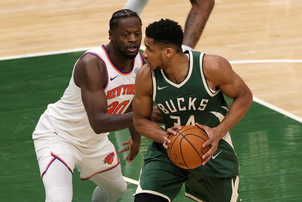 MILWAUKEE, WISCONSIN - MARCH 11: Giannis Antetokounmpo #34 of the Milwaukee Bucks is defended by Julius Randle #30 of the New York Knicks during the second half of a game at Fiserv Forum on March 11, 2021 in Milwaukee, Wisconsin. NOTE TO USER: User expressly acknowledges and agrees that, by downloading and or using this photograph, User is consenting to the terms and conditions of the Getty Images License Agreement. Stacy Revere/Getty Images/AFP (Photo by Stacy Revere / GETTY IMAGES NORTH AMERICA / Getty Images via AFP) (NBA Rumors)