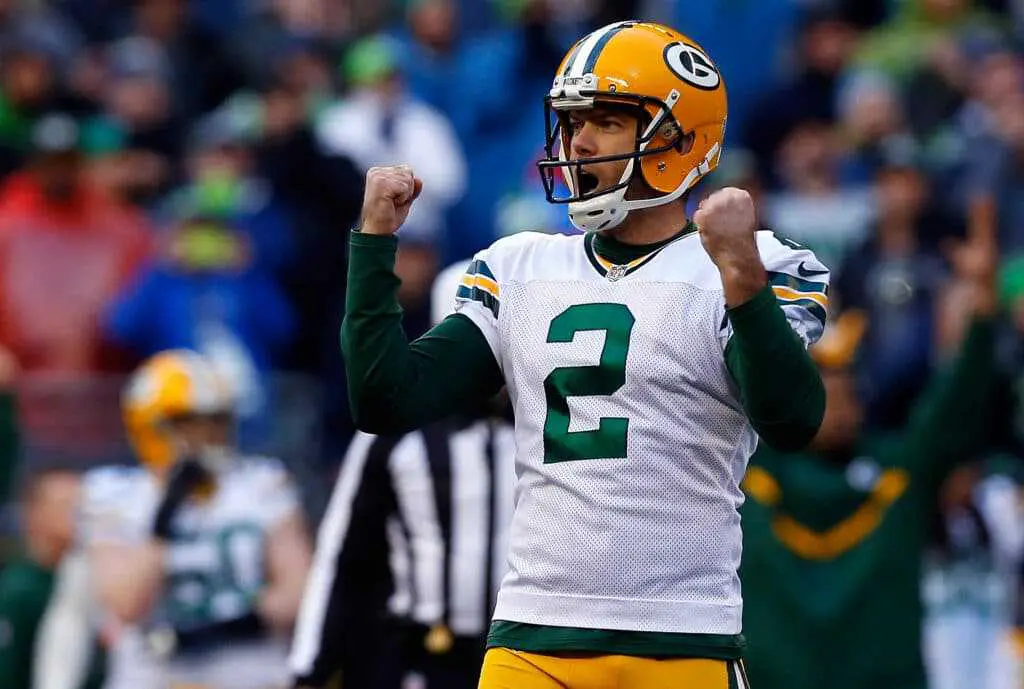 Green Bay Packers Kicker Mason Crosby celebrates after kicking a field goal to tie the game late in the fourth quarter of the 2015 NFC Championship game against the Seattle Seahawks at CenturyLink Field on January 18, 2015 in Seattle, Washington. (Tom Pennington / Getty Images)