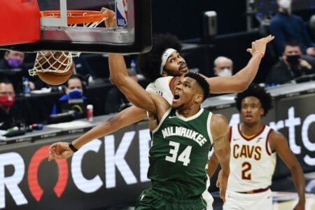 Giannis Antetokounmpo of the Milwaukee Bucks dunks during a game against the Cleveland Cavaliers