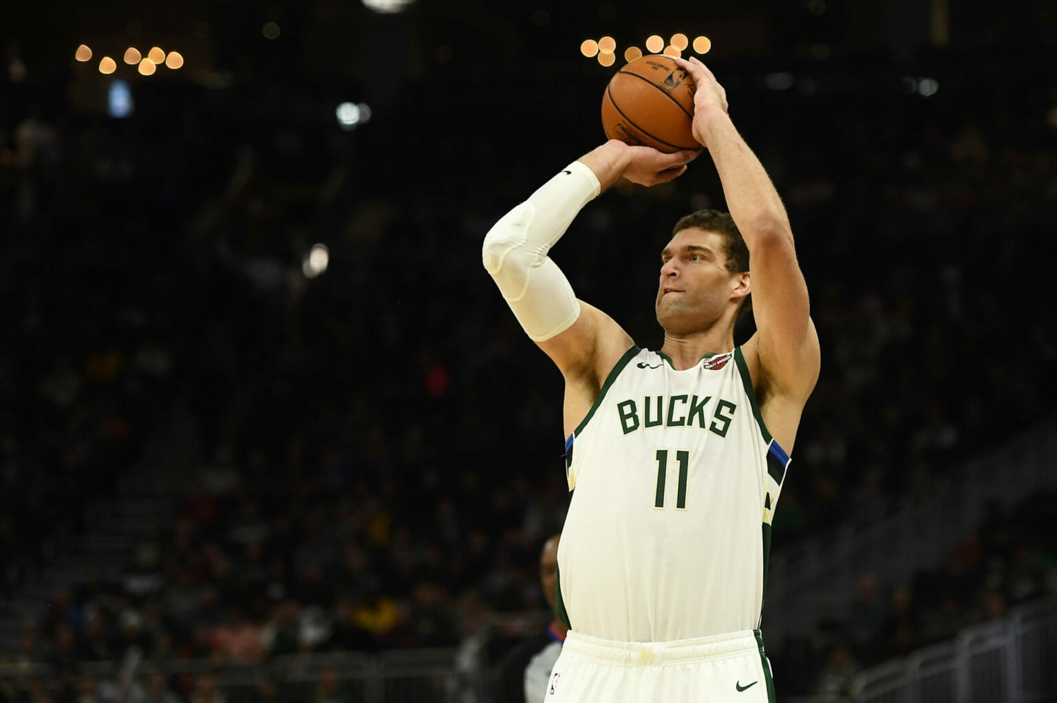 MILWAUKEE, WISCONSIN - NOVEMBER 25: Brook Lopez #11 of the Milwaukee Bucks takes a three point shot during a game against the Utah Jazz at Fiserv Forum on November 25, 2019 in Milwaukee, Wisconsin. NOTE TO USER: User expressly acknowledges and agrees that, by downloading and or using this photograph, User is consenting to the terms and conditions of the Getty Images License Agreement. (Photo by Stacy Revere/Getty Images) (NBA Rumors)