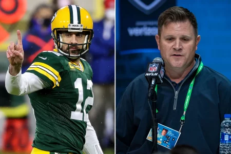 Aaron Rodgers and Brian Gutekunst of the Green Bay Packers