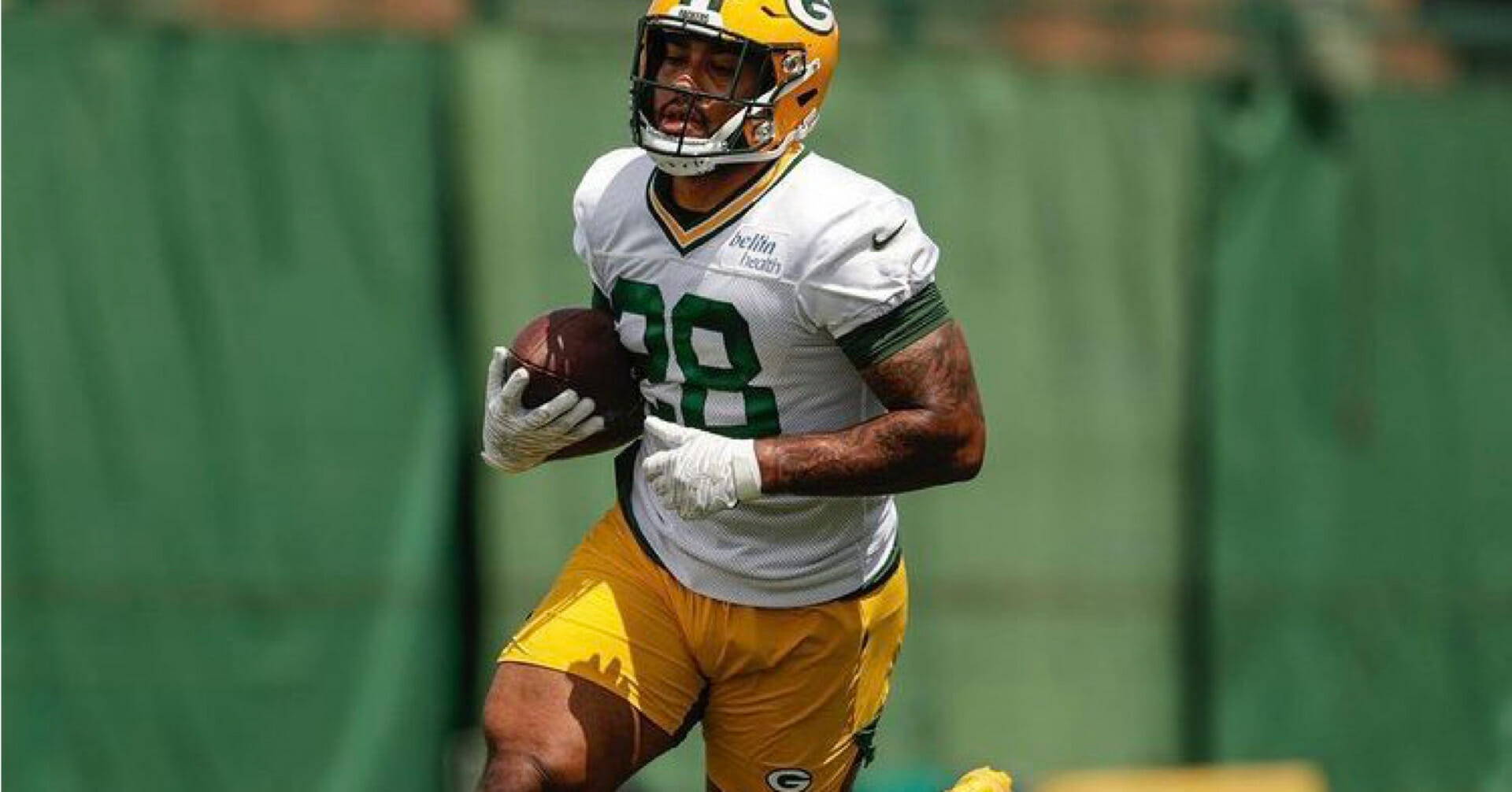 AJ Dillon, Packers number 28, is running back from Boston College