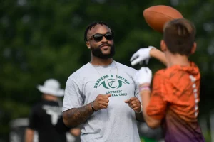 Amari Rodgers plays catch with a participant during youth football camp at Knoxville Catholic High School in Knoxville, Tenn. on Friday, July 8, 2022. Rodgers, a Catholic High School graduate and Clemson wide receiver, now plays for the Green Bay Packers. Calvin Mattheis/News Sentinel