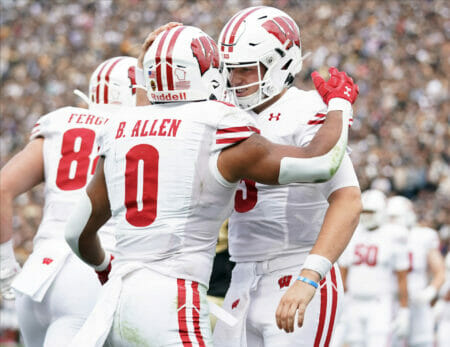 Oct 23, 2021; West Lafayette, Indiana, USA; Wisconsin Badgers running back Braelon Allen (0) is congratulated by Wisconsin Badgers quarterback Graham Mertz (5) after scoring a touchdown during the game at Ross-Ade Stadium. Mandatory Credit: Robert Goddin-USA TODAY Sports (Wisconsin Football)