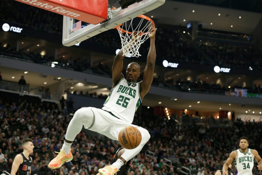 Oct 1, 2022; Milwaukee, Wisconsin, USA; Milwaukee Bucks center Serge Ibaka (25) dunks the ball against the Memphis Grizzlies in the first half at Fiserv Forum. Mandatory Credit: Michael McLoone-USA TODAY Sports