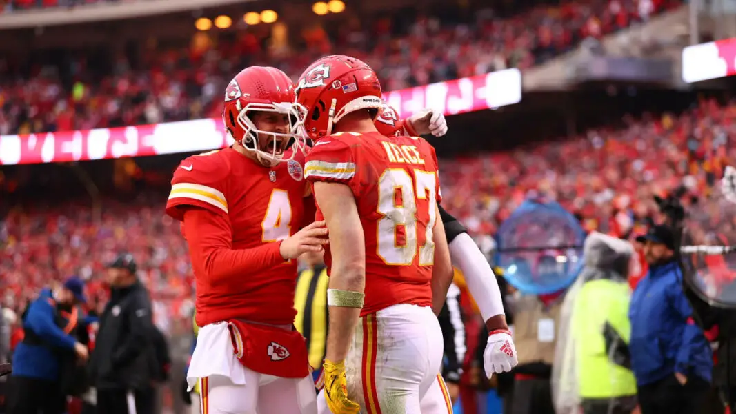 Chad Henne celebrates with Travis Kelce after touchown