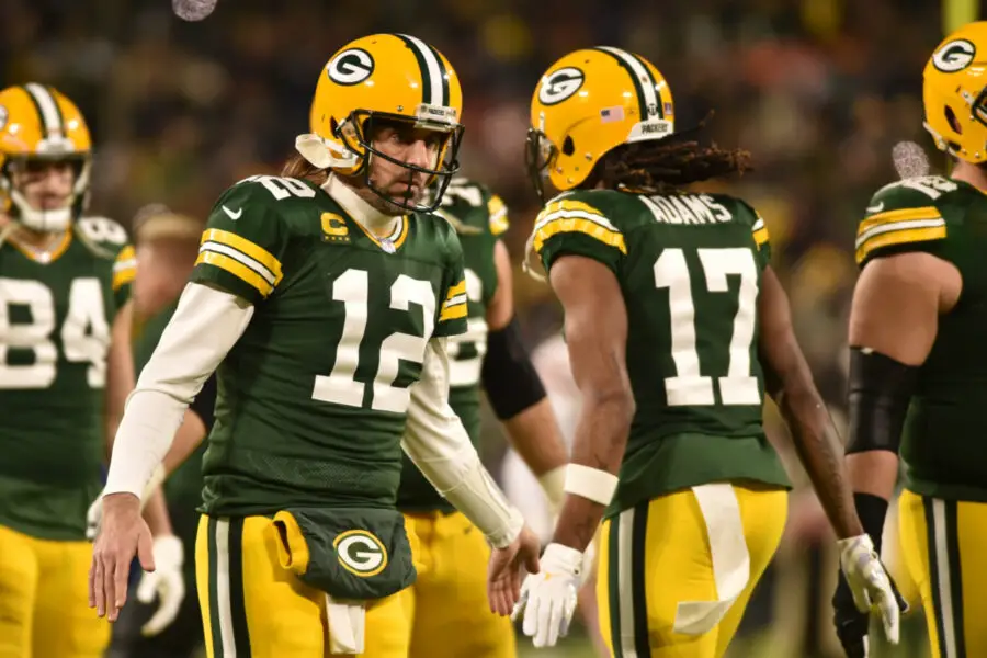 Jan 22, 2022; Green Bay, Wisconsin, USA; Green Bay Packers quarterback Aaron Rodgers (12) and wide receiver Davante Adams (17) in action against the San Francisco 49ers during a NFC Divisional playoff football game at Lambeau Field. Mandatory Credit: Jeffrey Becker-USA TODAY Sports