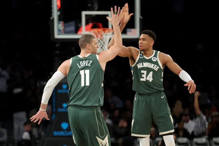 Feb 28, 2023; Brooklyn, New York, USA; Milwaukee Bucks center Brook Lopez (11) high fives forward Giannis Antetokounmpo (34) during the third quarter against the Brooklyn Nets at Barclays Center. Mandatory Credit: Brad Penner-USA TODAY Sports (NBA Rumors)