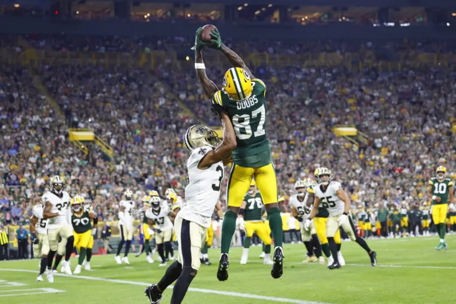 Aug 19, 2022; Green Bay, Wisconsin, USA; Green Bay Packers wide receiver Romeo Doubs (87) catches a pass to score a touchdown during the second quarter against the New Orleans Saints at Lambeau Field. Mandatory Credit: Jeff Hanisch-USA TODAY Sports
