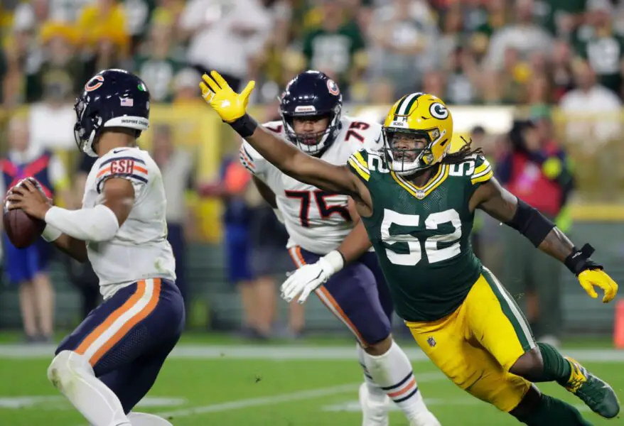 Green Bay Packers linebacker Rashan Gary (52) pressures Chicago Bears quarterback Justin Fields (1) during their football game on Sunday, September 18, 2022 at Lambeau Field. in Green Bay, Wis. Wm. Glasheen USA TODAY NETWORK-Wisconsin Apc Pack Vs Bears 4714 091822wag