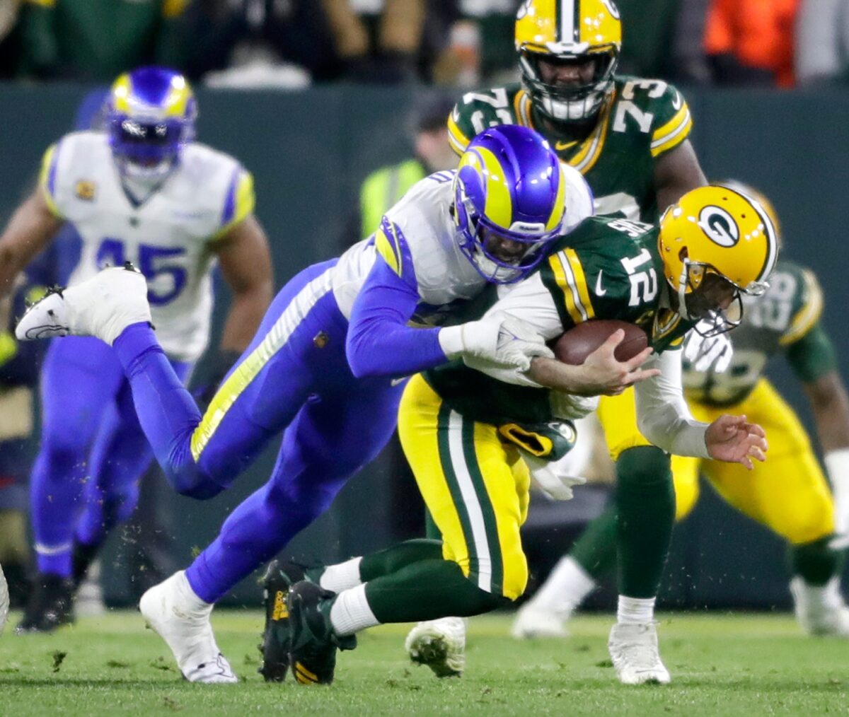 Los Angeles Rams linebacker Leonard Floyd (54) sacks Green Bay Packers quarterback Aaron Rodgers (12) during their football game on Monday December, 19, 2022 at Lambeau Field in Green Bay, Wis. Wm. Glasheen USA TODAY NETWORK-Wisconsin Apc Packers Vs Rams 81655 121922 Wag