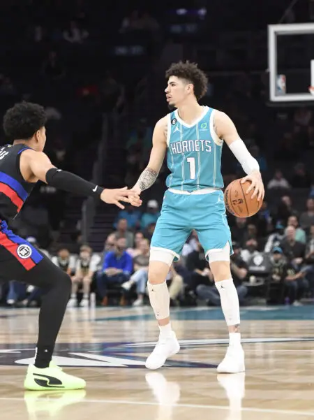 Feb 27, 2023; Charlotte, North Carolina, USA; Charlotte Hornets guard LaMelo Ball (1) looks to pass during the first half against the Detroit Pistons at the Spectrum Center. Mandatory Credit: Sam Sharpe-USA TODAY Sports (NBA News)