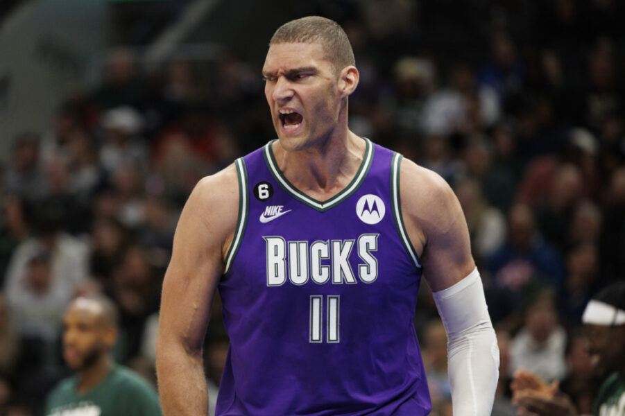 Feb 24, 2023; Milwaukee, Wisconsin, USA; Milwaukee Bucks center Brook Lopez (11) reacts after a foul call during the fourth quarter against the Miami Heat at Fiserv Forum. Mandatory Credit: Jeff Hanisch-USA TODAY Sports