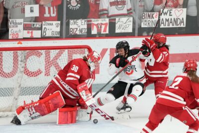 Wisconsin Badgers goaltender Cami Kronish making a save against Ohio State