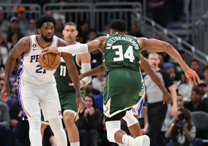Mar 4, 2023; Milwaukee, Wisconsin, USA; Milwaukee Bucks forward Giannis Antetokounmpo (34) drives to the basket against Philadelphia 76ers center Joel Embiid (21) in the second half at Fiserv Forum. Mandatory Credit: Michael McLoone-USA TODAY Sports