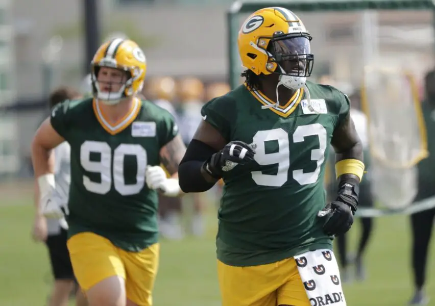 Green Bay Packers defensive line coach Jerry Montgomery calls out TJ Slaton