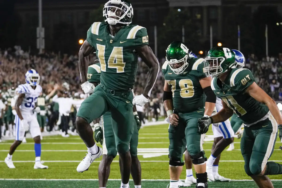 Sep 3, 2021; Charlotte, North Carolina, USA; Charlotte 49ers wide receiver Grant DuBose (14) celebrates after a late touchdown against the Duke Blue Devils during the second half at Jerry Richardson Stadium. Mandatory Credit: Jim Dedmon-USA TODAY Sports
