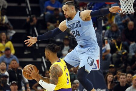Apr 26, 2023; Memphis, Tennessee, USA; Memphis Grizzlies forward Dillon Brooks (24) defends Los Angeles Lakers guard D'Angelo Russell (1) during the second half during game five of the 2023 NBA playoffs at FedExForum. Mandatory Credit: Petre Thomas-USA TODAY Sports (NBA News - Bucks, NBA Rumors)