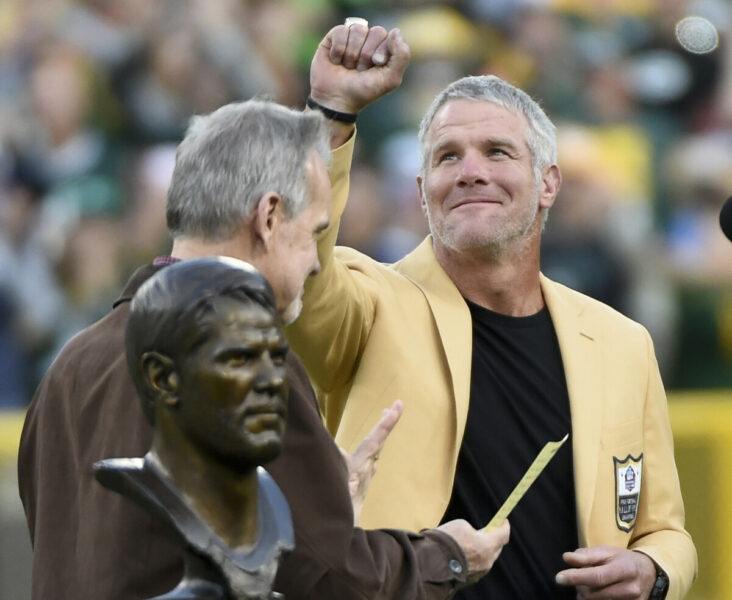 Oct 16, 2016; Green Bay, WI, USA; Former Green Bay Packers quarterback Brett Favre admires his Hall of Fame ring during half time ceremonies at Lambeau Field. Mandatory Credit: Benny Sieu-USA TODAY Sports