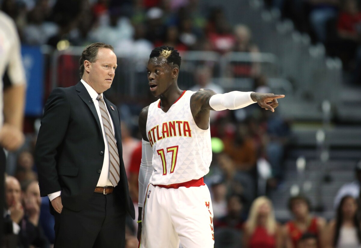 Apr 28, 2017; Atlanta, GA, USA; Atlanta Hawks head coach Mike Budenholzer talks with guard Dennis Schroder (17) in the first quarter of a game against the Washington Wizards in game six of the first round of the 2017 NBA Playoffs at Philips Arena. Mandatory Credit: Jason Getz-USA TODAY Sports NBA News
