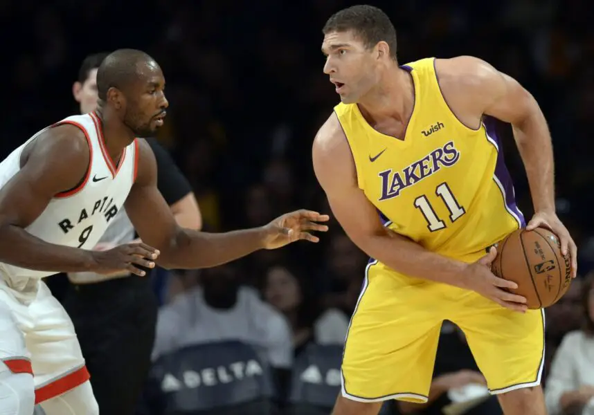 October 27, 2017; Los Angeles, CA, USA; Los Angeles Lakers center Brook Lopez (11) controls the ball against Toronto Raptors forward Serge Ibaka (9) during the first half at Staples Center. Mandatory Credit: Gary A. Vasquez-USA TODAY Sports NBA Rumors