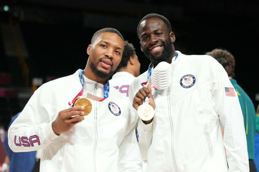 Aug 7, 2021; Saitama, Japan; United States Damian Lillard (left) and United States Draymond Green (right) celebrate with their gold medals during the Tokyo 2020 Olympic Summer Games at Saitama Super Arena. Mandatory Credit: Kyle Terada-USA TODAY Sports NBA news