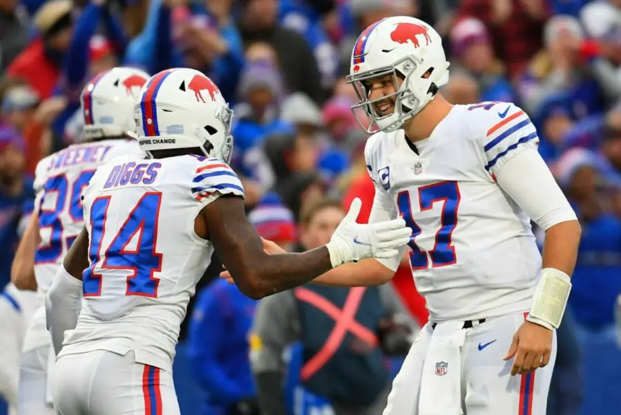 Oct 31, 2021; Orchard Park, New York, USA; Buffalo Bills wide receiver Stefon Diggs (14) celebrates his touchdown catch with quarterback Josh Allen (17) against the Miami Dolphins during the second half at Highmark Stadium. Mandatory Credit: Rich Barnes-USA TODAY Sports (NFL News - Green Bay Packers)