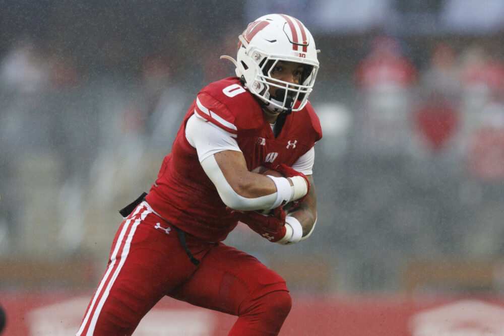 Nov 5, 2022; Madison, Wisconsin, USA; Wisconsin Badgers running back Braelon Allen (0) rushes with the football during the fourth quarter against the Maryland Terrapins at Camp Randall Stadium. Mandatory Credit: Jeff Hanisch-USA TODAY Sports