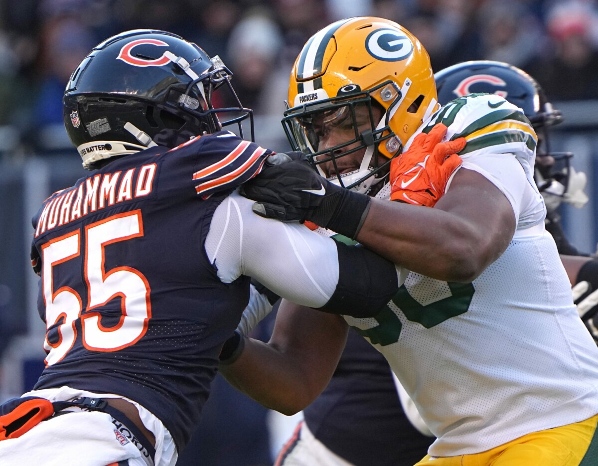 Green Bay Packers guard Zach Tom (50) blocks Chicago Bears defensive end Al-Quadin Muhammad (55) quarter of their game Sunday, December 4, 2022 at Soldier Field in Chicago, Ill. The Green Bay Packers beat the Chicago Bears 28-19. Tom was filling in for offensive tackle David Bakhtiari, who had his appendix removed earlier in the week. Packers04 17