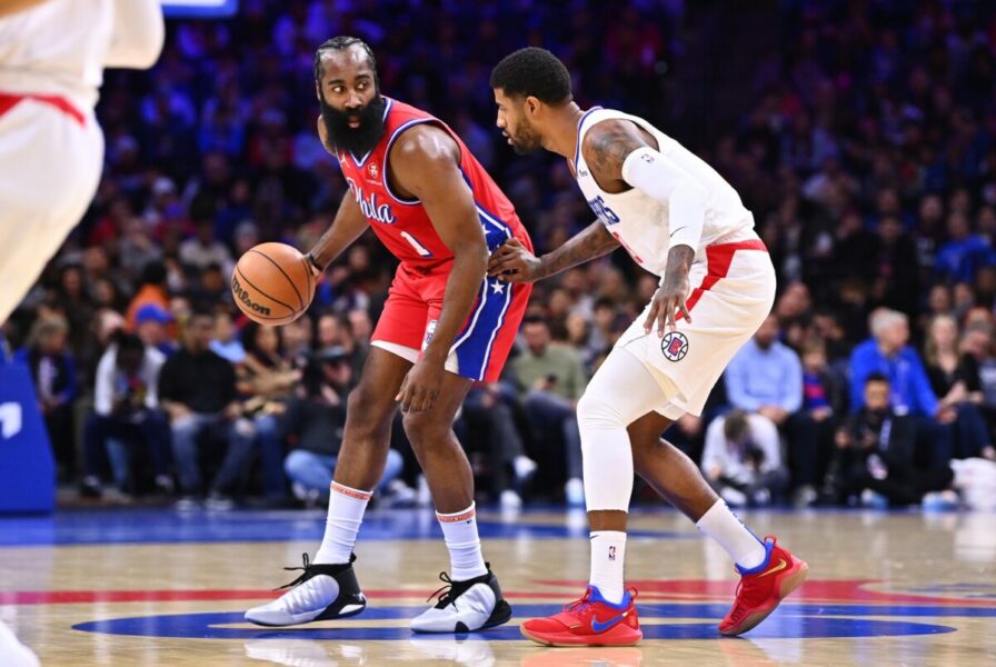 Dec 23, 2022; Philadelphia, Pennsylvania, USA; Philadelphia 76ers guard James Harden (1) shields the ball from Los Angeles Clippers forward Paul George (13) in the first quarter at Wells Fargo Center. Mandatory Credit: Kyle Ross-USA TODAY Sports NBA Rumors