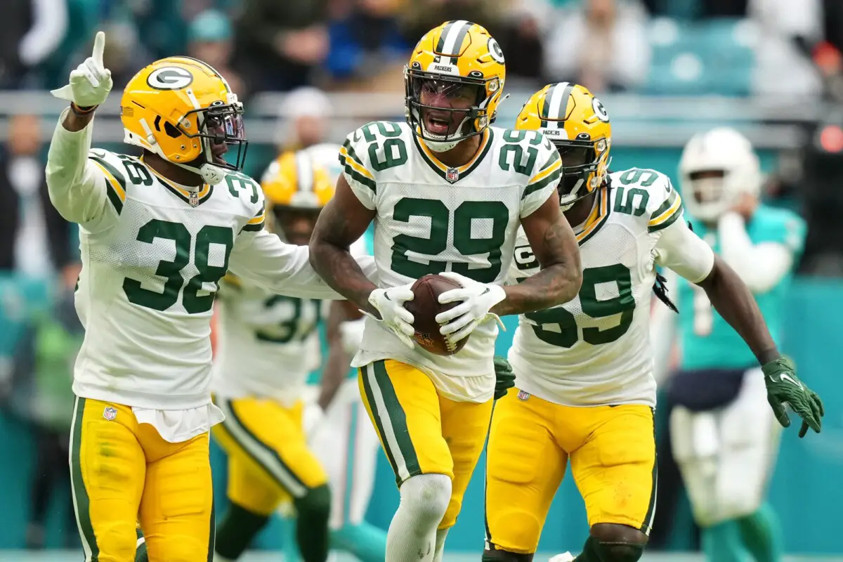 Dec 25, 2022; Miami Gardens, Florida, USA; Green Bay Packers cornerback Rasul Douglas (29) celebrates with teammates after intercepting a pass from Miami Dolphins quarterback Tua Tagovailoa (not pictured) during the second half at Hard Rock Stadium. Mandatory Credit: Jasen Vinlove-USA TODAY Sports