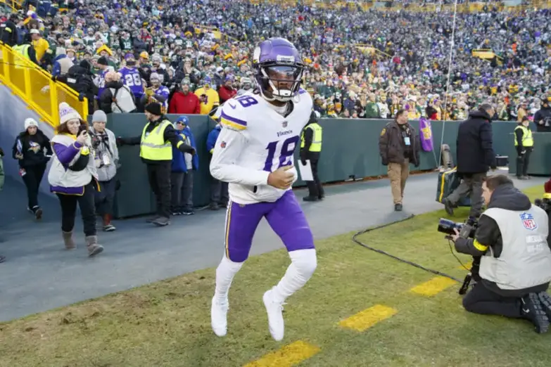 Jan 1, 2023; Green Bay, Wisconsin, USA; Minnesota Vikings wide receiver Justin Jefferson (18) prior to the game against the Green Bay Packers at Lambeau Field. Mandatory Credit: Jeff Hanisch-USA TODAY Sports