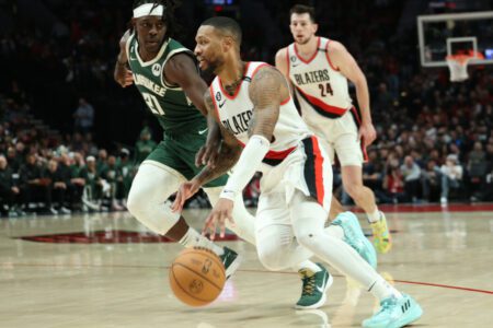 Feb 6, 2023; Portland, Oregon, USA; Portland Trail Blazers guard Damian Lillard (0) drives the lane against Milwaukee Bucks guard Jrue Holiday (21) in the second half at Moda Center. Mandatory Credit: Jaime Valdez-USA TODAY Sports (NBA News, NBA Rumors)