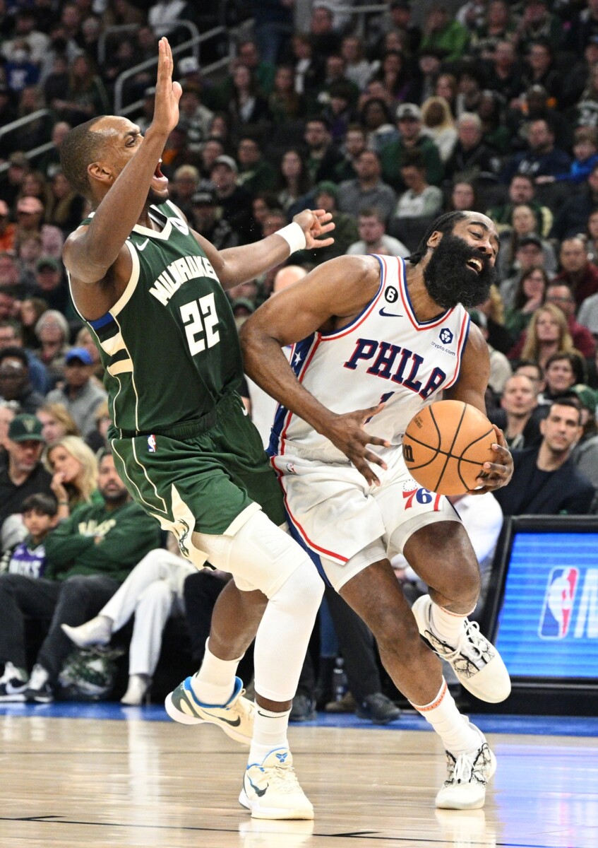 Mar 4, 2023; Milwaukee, Wisconsin, USA; Philadelphia 76ers guard James Harden (1) is fouled on the play by Milwaukee Bucks forward Khris Middleton (22) in the second half at Fiserv Forum. Mandatory Credit: Michael McLoone-USA TODAY Sports (NBA Rumors)