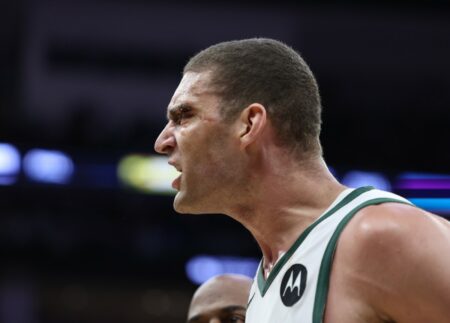 Mar 13, 2023; Sacramento, California, USA; Milwaukee Bucks center Brook Lopez (11) walks off the court after an altercation against the Sacramento Kings during the fourth quarter at Golden 1 Center. Mandatory Credit: Kelley L Cox-USA TODAY Sports NBA Rumors