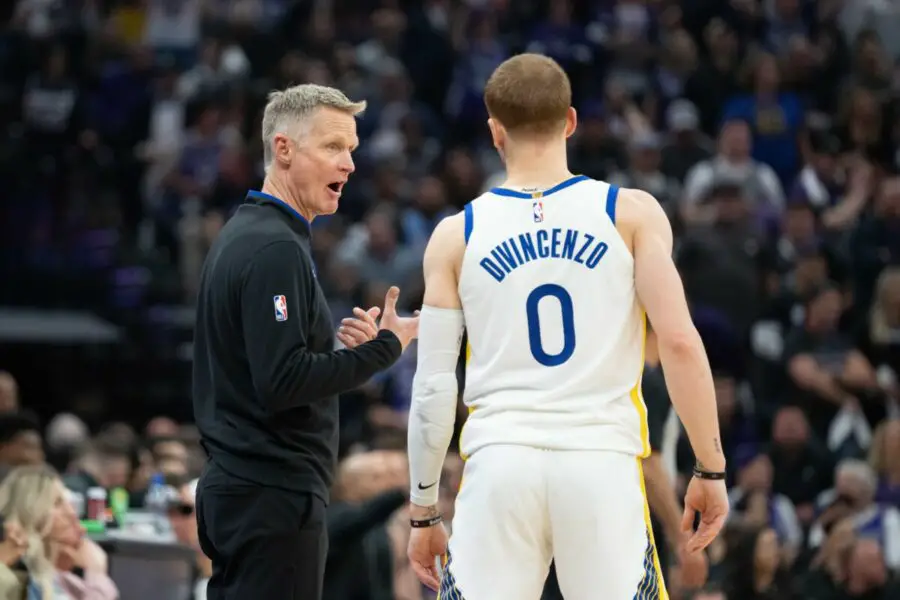 April 17, 2023; Sacramento, California, USA; Golden State Warriors head coach Steve Kerr (left) talks to guard Donte DiVincenzo (0) during the second quarter in game two of the first round of the 2023 NBA playoffs against the Sacramento Kings at Golden 1 Center. Mandatory Credit: Kyle Terada-USA TODAY Sports